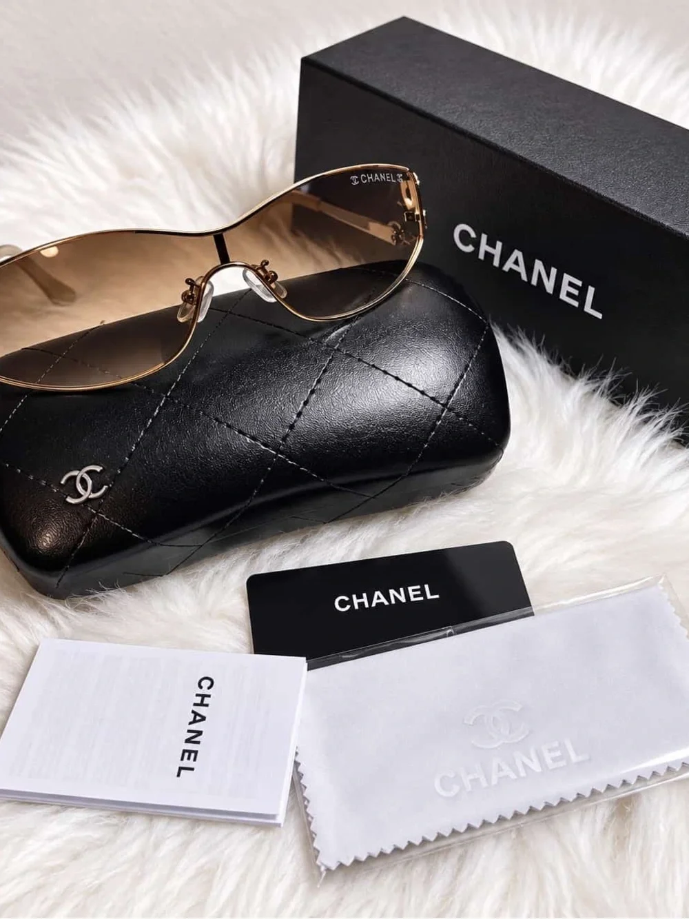 CHANEL Brown Gradient Rimless Women's Sunglasses with Gold Accents